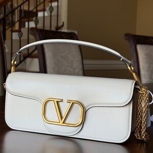 Valentino Garavani Locò Calfskin Shoulder Bag in Ivory.